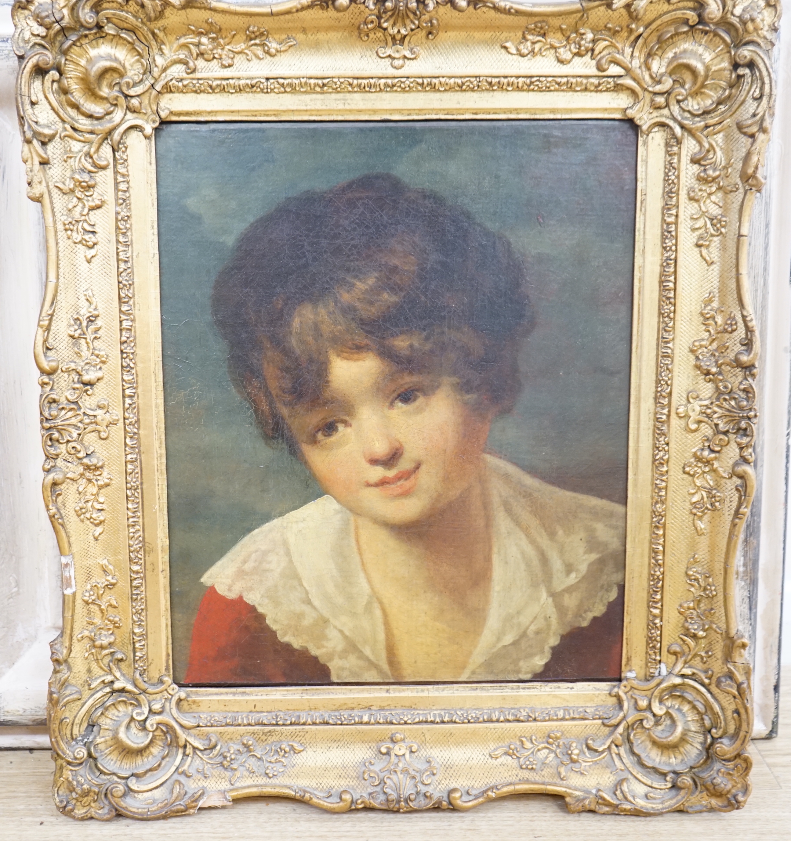 Late 19th / early 20th century Naive school, oil on canvas, portrait of a young boy, 40cm x 33cm